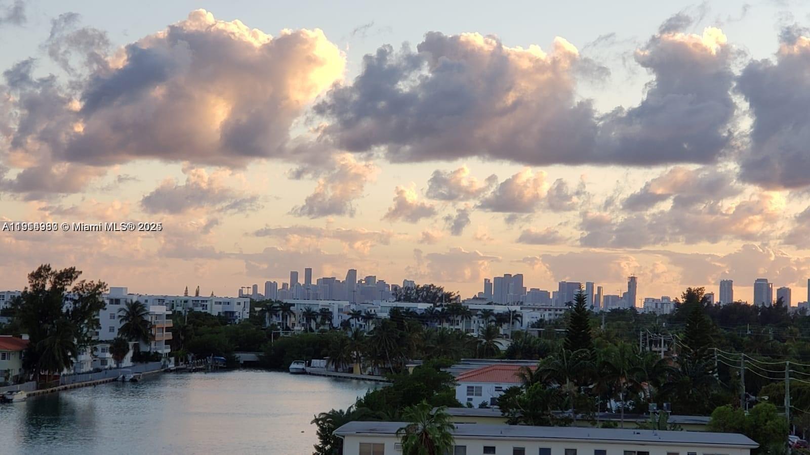 8001 Crespi Boulevard, Unit 6D Miami Beach, FL 33141 - Photo 25 of 29 a view of a lake
