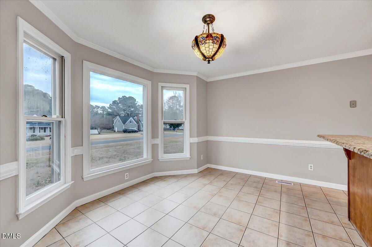 2805 Mary Marvin Trail Willow Spring, NC 27592 - Photo 13 of 33 a view of an empty room and window