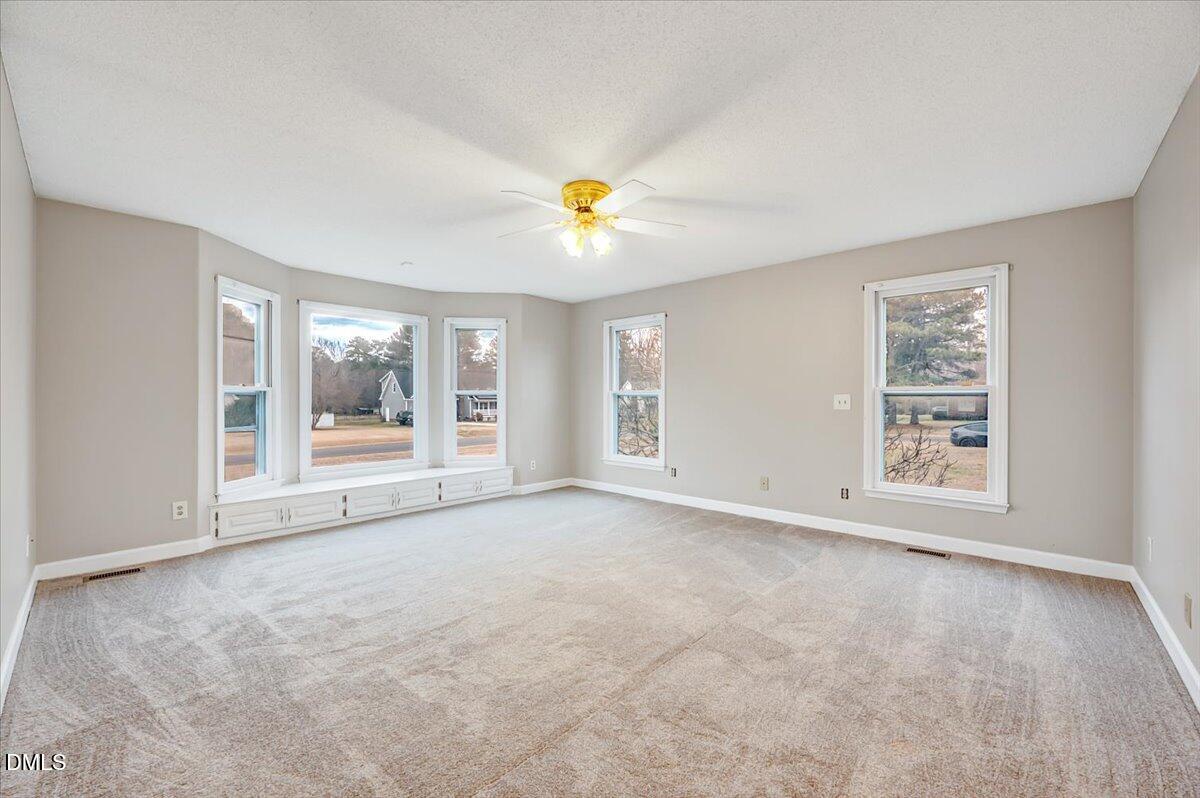 2805 Mary Marvin Trail Willow Spring, NC 27592 - Photo 14 of 33 a view of an empty room with a window