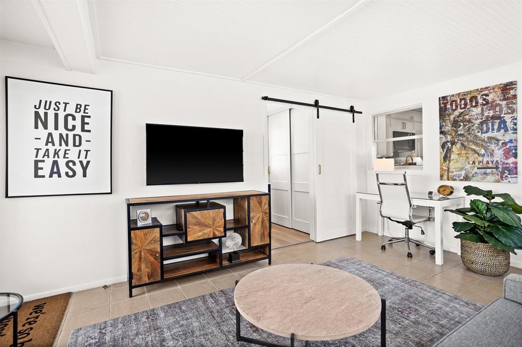 3488 40th Way North St. Petersburg, FL 33713 - Photo 20 of 70 a living room with furniture and a flat screen tv