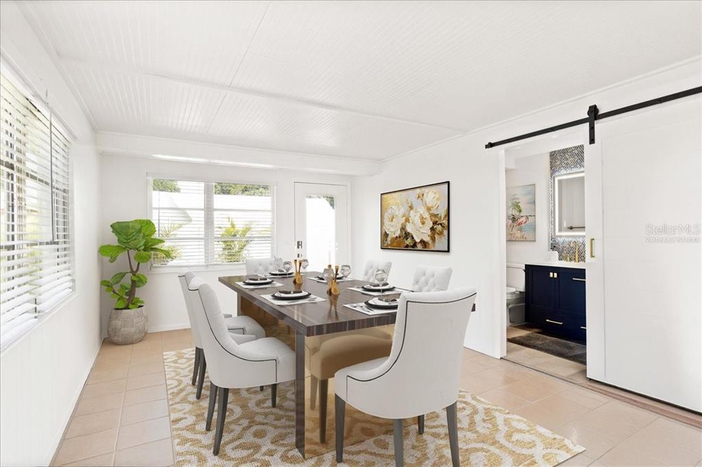 3488 40th Way North St. Petersburg, FL 33713 - Photo 22 of 70 a view of a dining room with furniture and a window