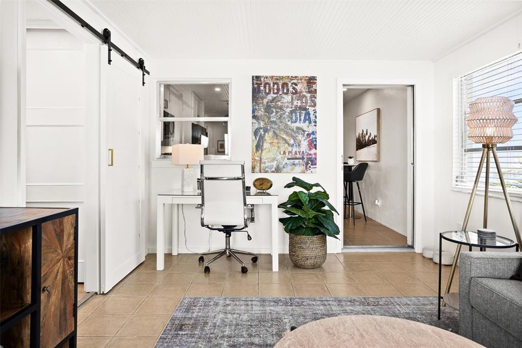 3488 40th Way North St. Petersburg, FL 33713 - Photo 24 of 70 a living room with furniture and a potted plant