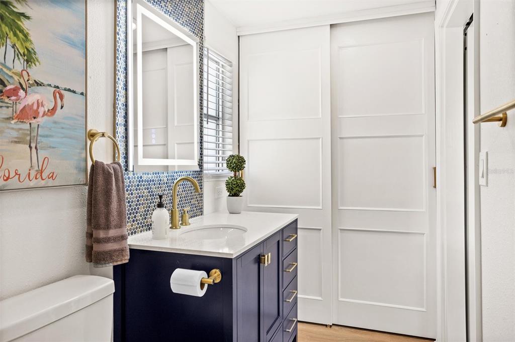 3488 40th Way North St. Petersburg, FL 33713 - Photo 26 of 70 a bathroom with a sink and a mirror