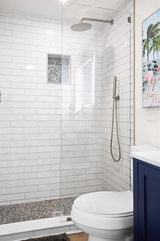 3488 40th Way North St. Petersburg, FL 33713 - Photo 29 of 70 a bathroom with a toilet and shower