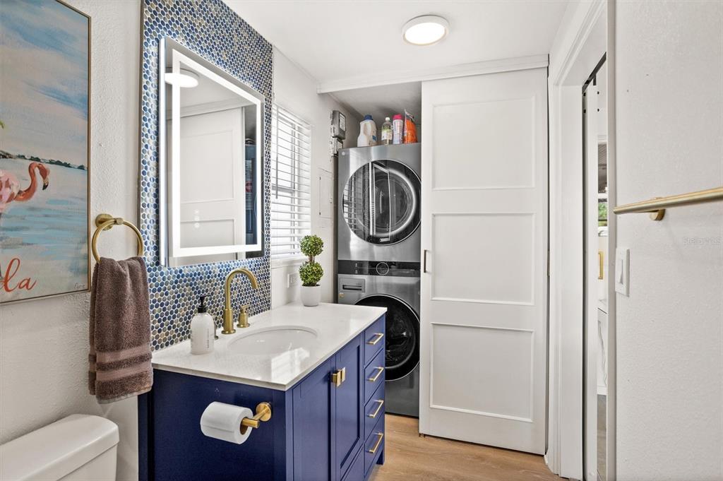 3488 40th Way North St. Petersburg, FL 33713 - Photo 31 of 70 a bathroom with a sink and a mirror