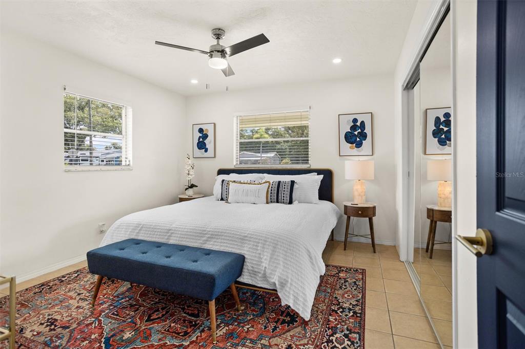 3488 40th Way North St. Petersburg, FL 33713 - Photo 33 of 70 a bed room with a bed and a chair