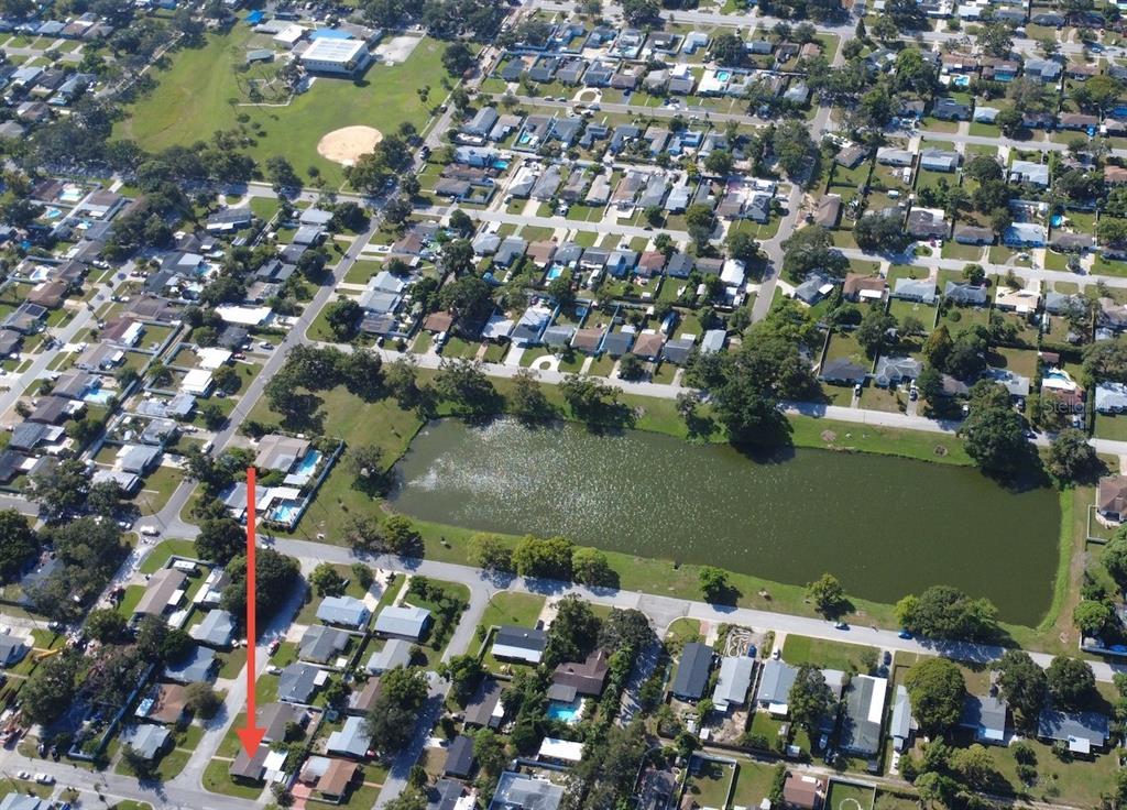 3488 40th Way North St. Petersburg, FL 33713 - Photo 62 of 70 an aerial view of a house with a lake view