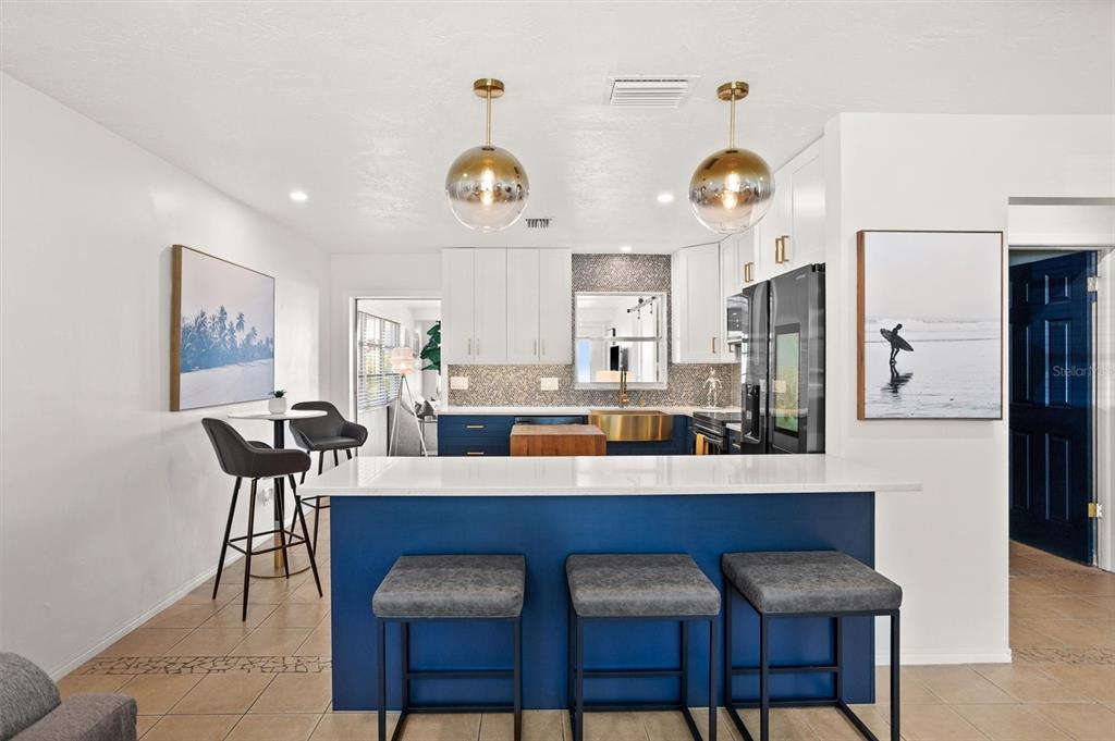 3488 40th Way North St. Petersburg, FL 33713 - Photo 7 of 70 a view of a dining room with furniture and chandelier