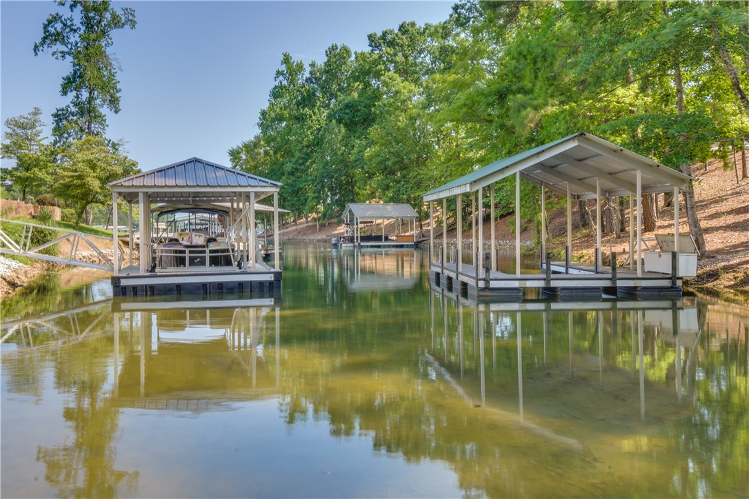 206 Petty Road Seneca, SC 29672 - Photo 6 of 48 A tranquil waterfront, offering direct access for aquatic pursuits.