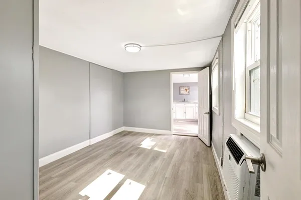 a view of an empty room and window