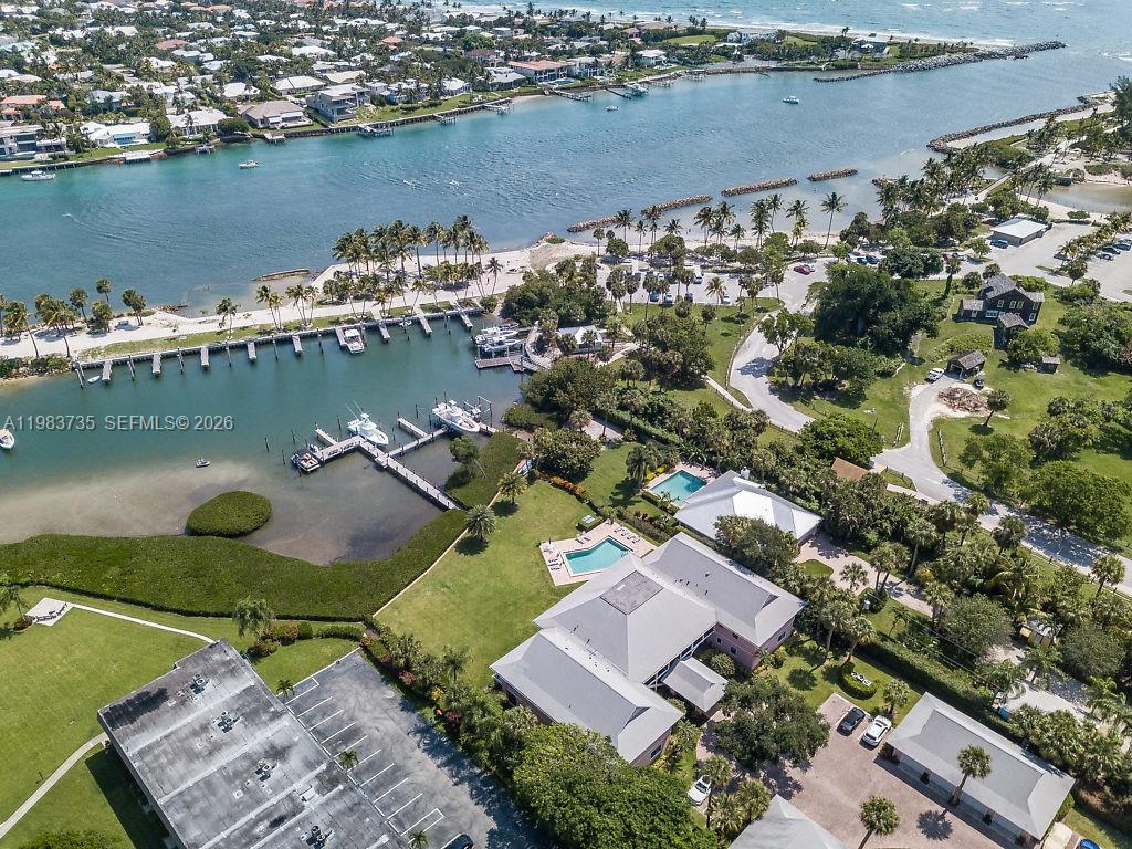 851 Saturn Street, Unit D Jupiter, FL 33477 - Photo 4 of 60 an aerial view of a house with a lake view