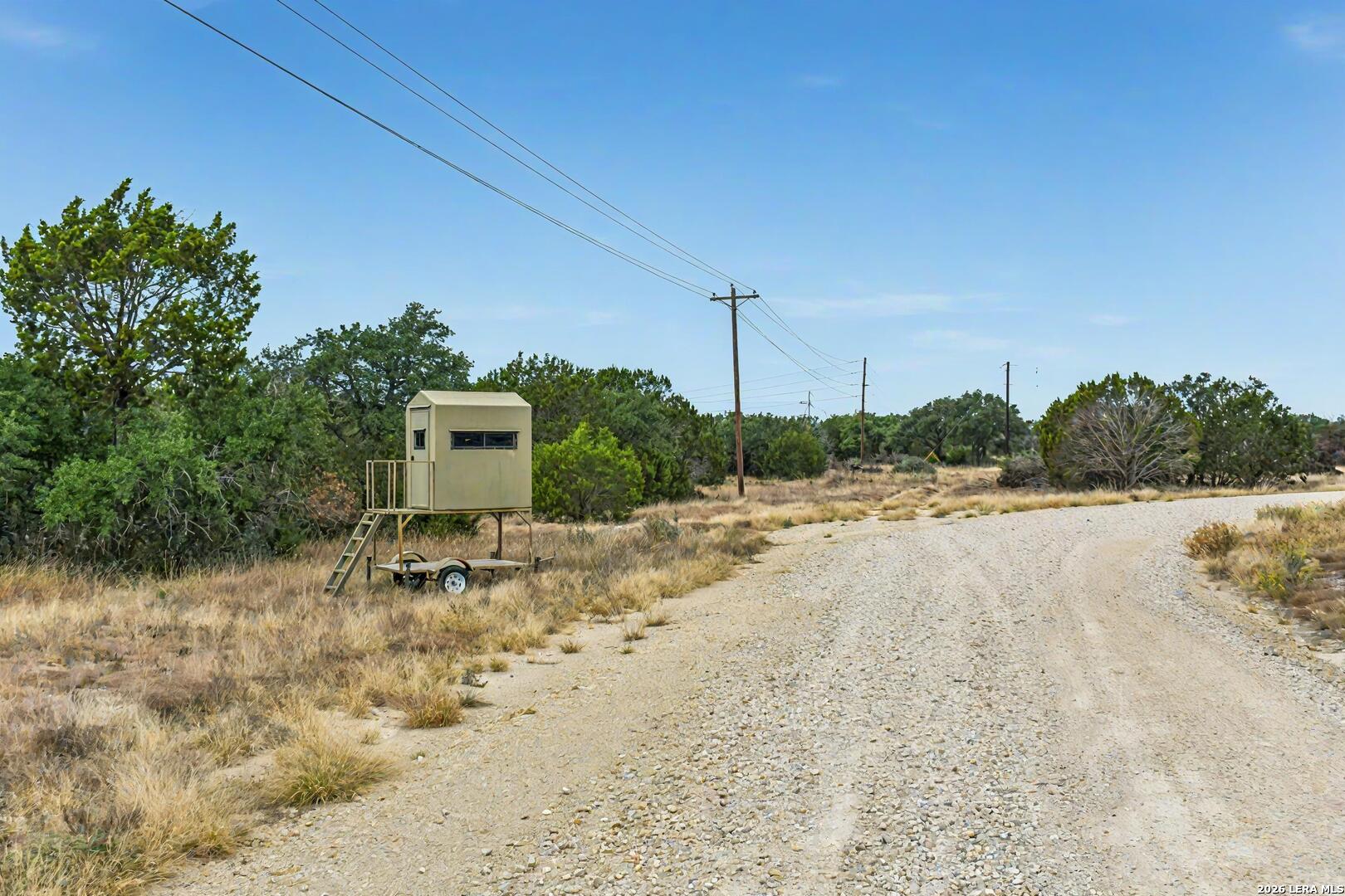 9 Broken Arrow Road Harper, TX 78631 - Photo 12 of 19 a view of a lake with a beach