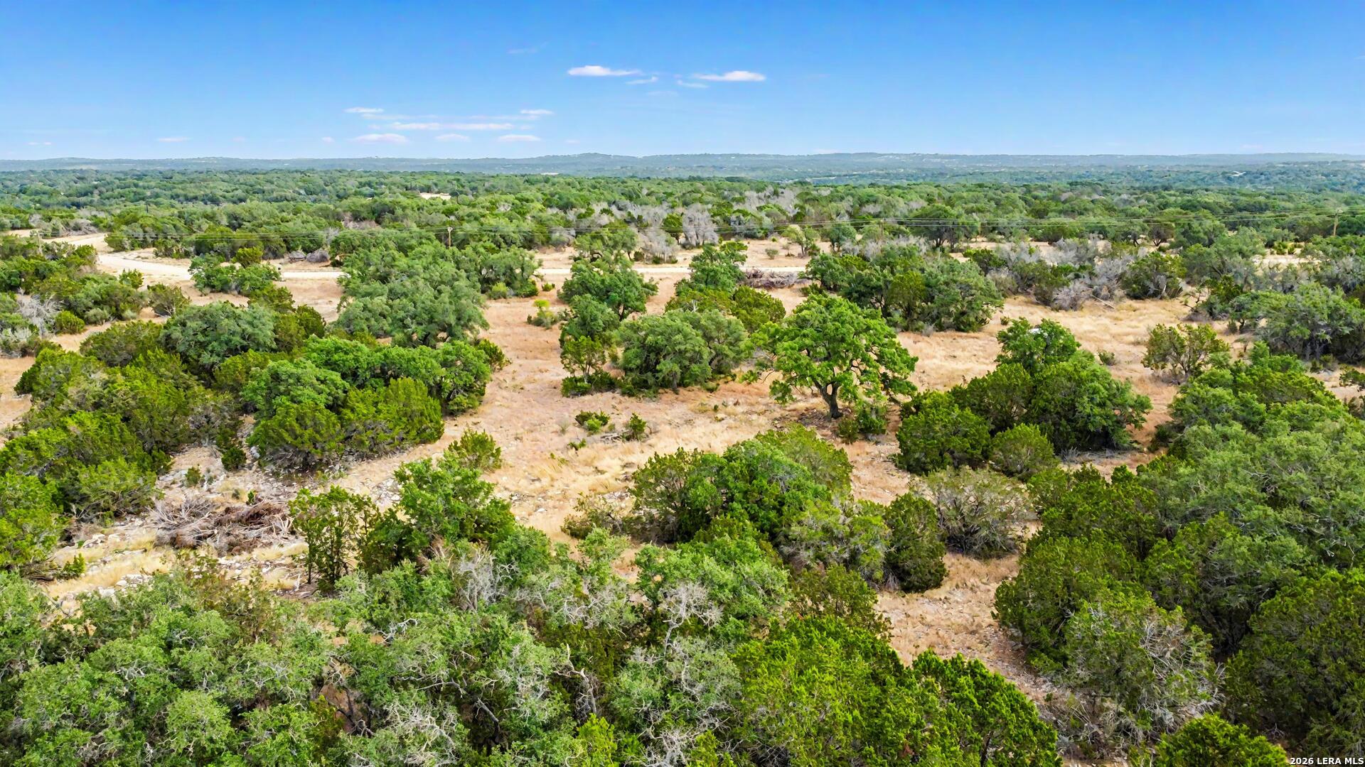 9 Broken Arrow Road Harper, TX 78631 - Photo 7 of 19 a view of a green field