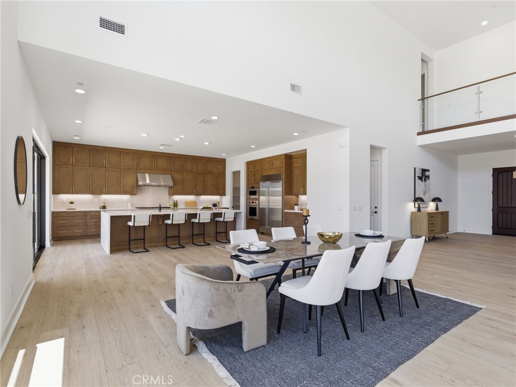 12010 Northstar Lane Porter Ranch, CA 91326 - Photo 6 of 49 Dining Room to Kitchen: Fernwood - The Ridge Collection at Bella Vista - Photo of another Fernwood - Not actual home for sale - Homesite 79 is still under construction