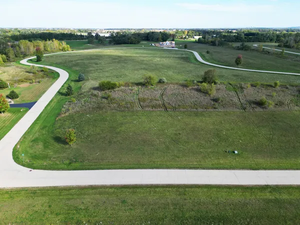 a view of a golf course with a lake