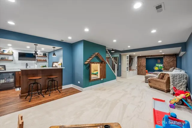 a view of kitchen and dining room with furniture