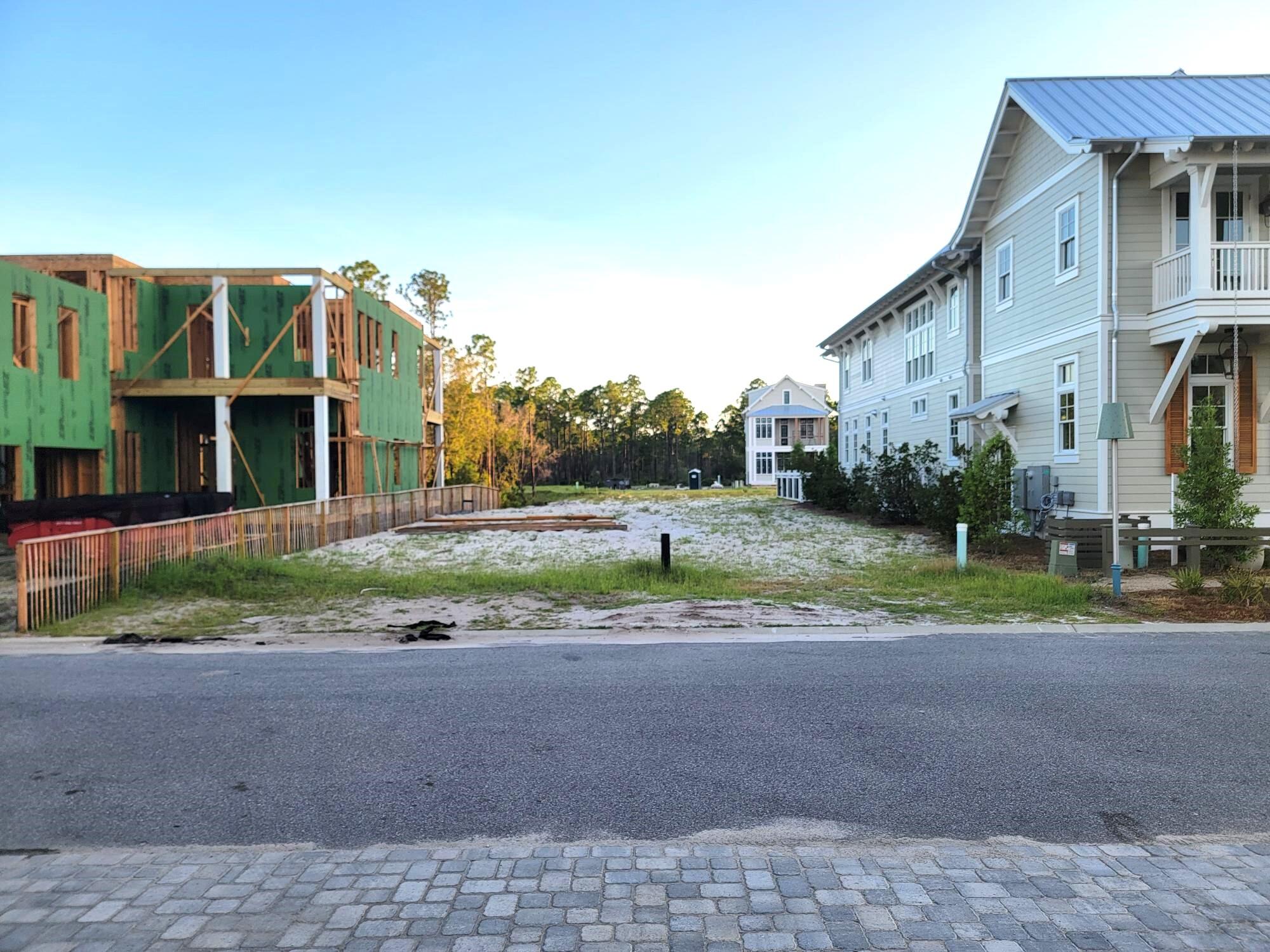 Lot 32 String Lily Cove Santa Rosa Beach, FL 32459 - Photo 4 of 15 a view of a house with a yard and large trees