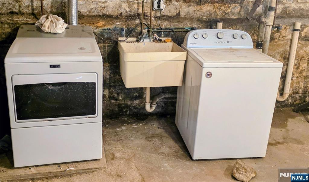 245 Beech Street, Unit 2 Kearny, NJ 07032 - Photo 14 of 16 a utility room with dryer and washer