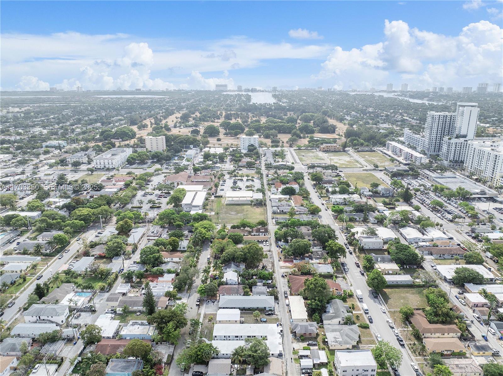 1946 Pierce Street, Unit 3 Hollywood, FL 33020 - Photo 16 of 43 an aerial view of residential building with green space