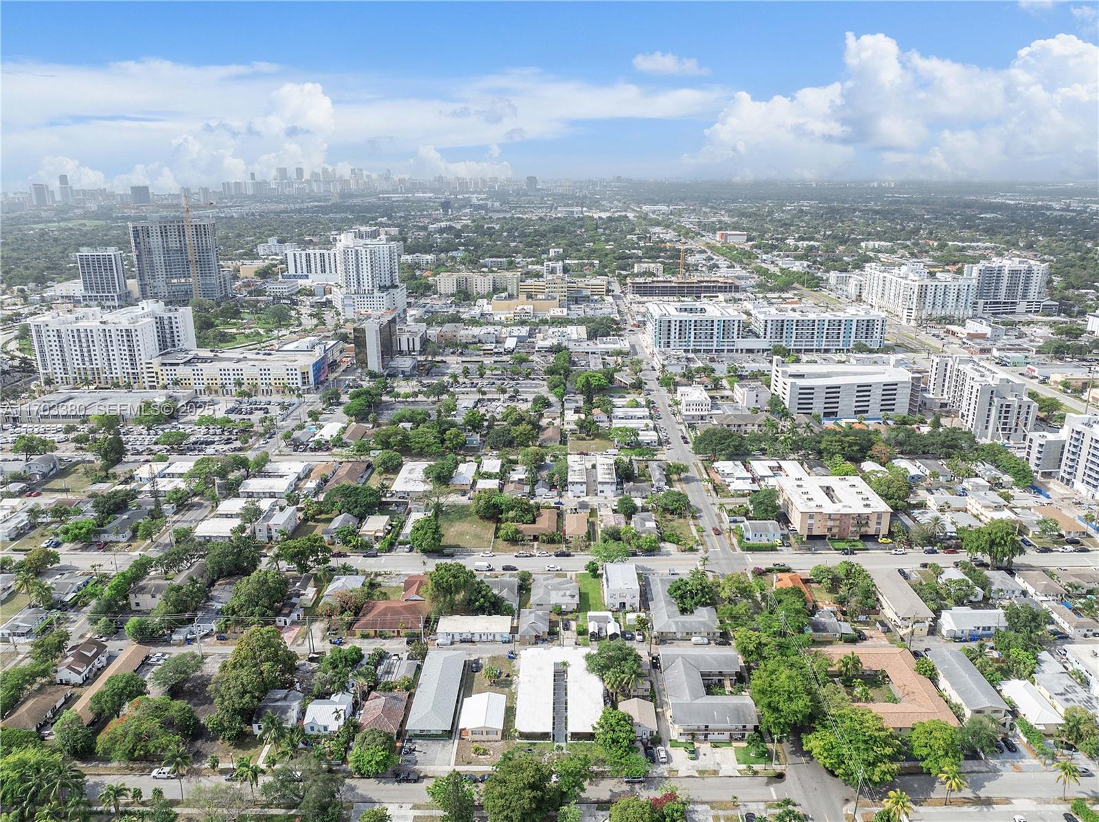 1946 Pierce Street, Unit 3 Hollywood, FL 33020 - Photo 17 of 43 an aerial view of residential building with green space