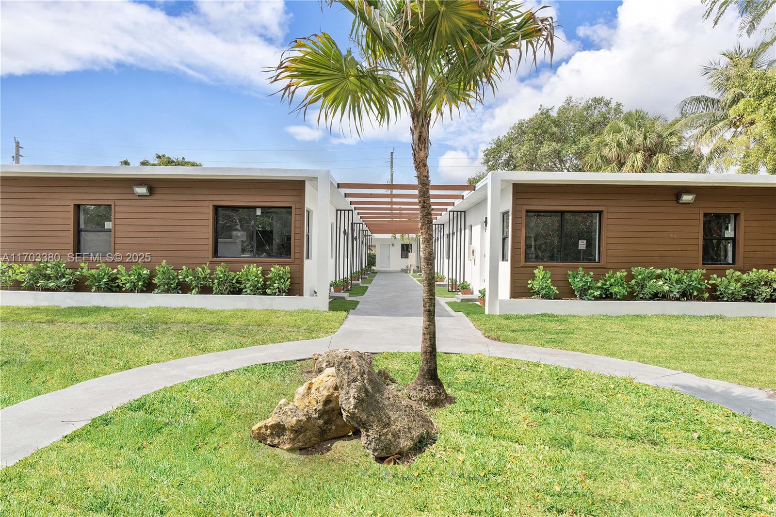 1946 Pierce Street, Unit 3 Hollywood, FL 33020 - Photo 3 of 43 a front view of house with yard and green space