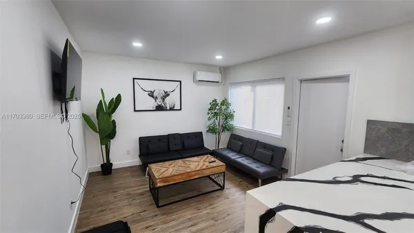 a living room with furniture and a couch
