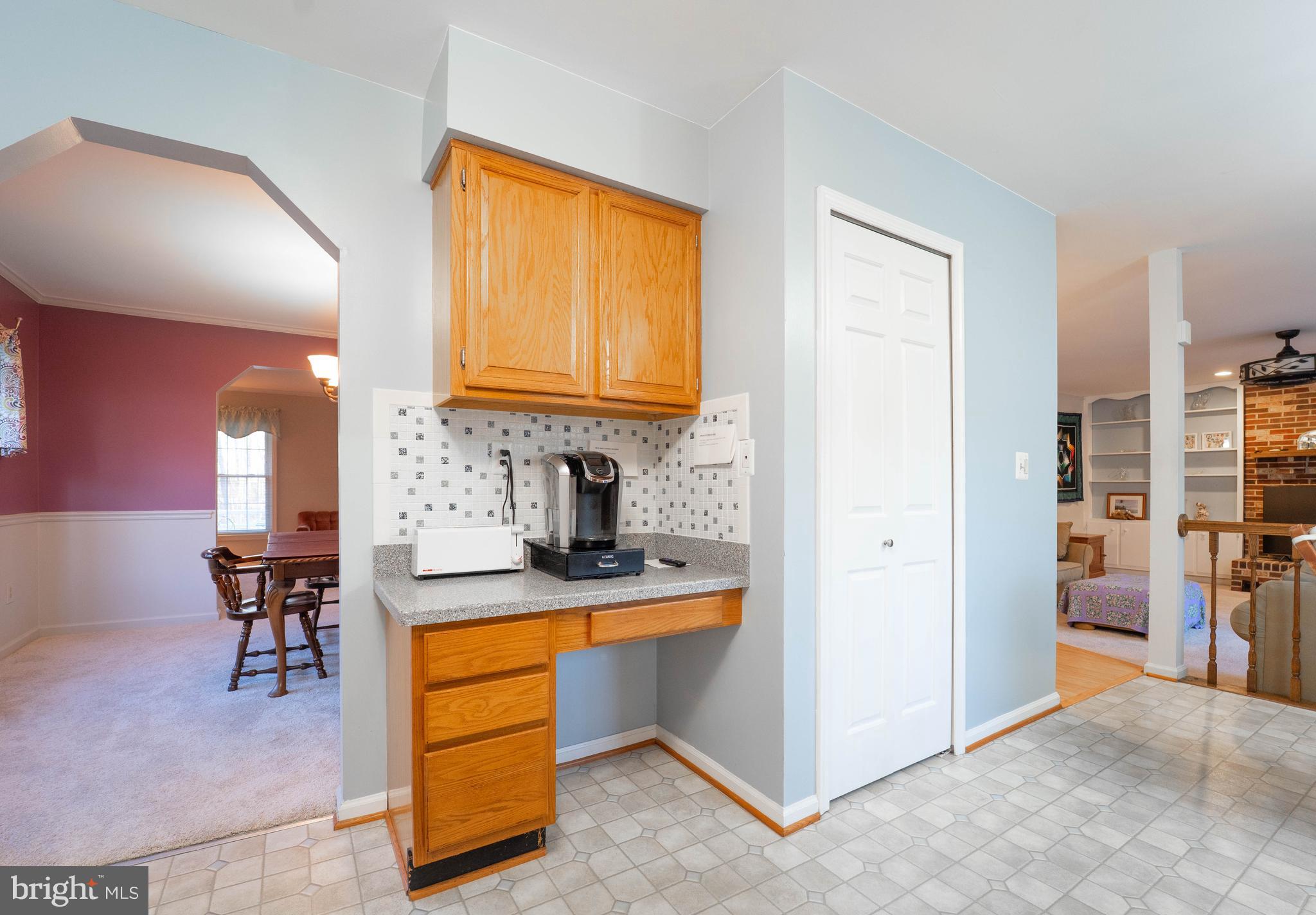 10531 Hunters Way Laurel, MD 20723 - Photo 12 of 42 a view of kitchen with cabinets and window