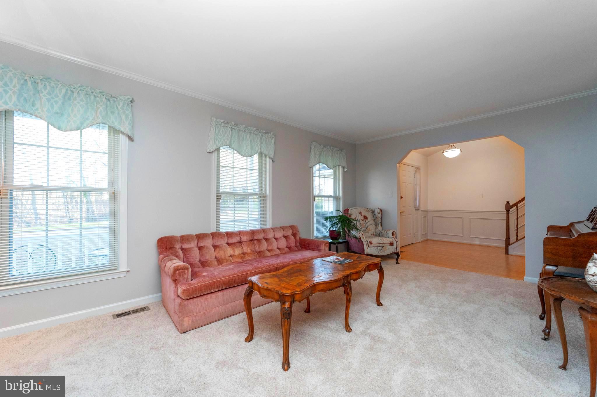10531 Hunters Way Laurel, MD 20723 - Photo 5 of 42 a living room with furniture and a window