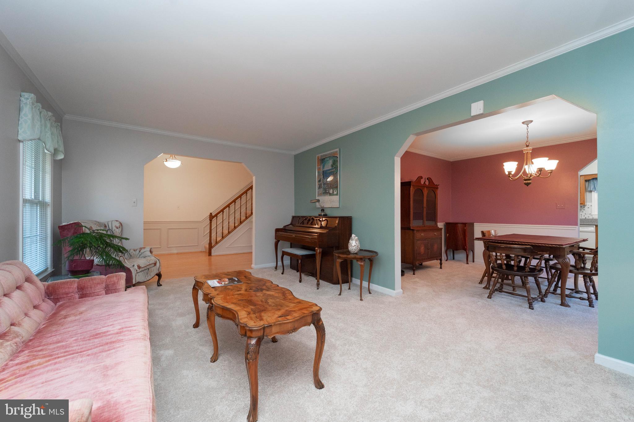 10531 Hunters Way Laurel, MD 20723 - Photo 6 of 42 a lobby with furniture and a potted plant