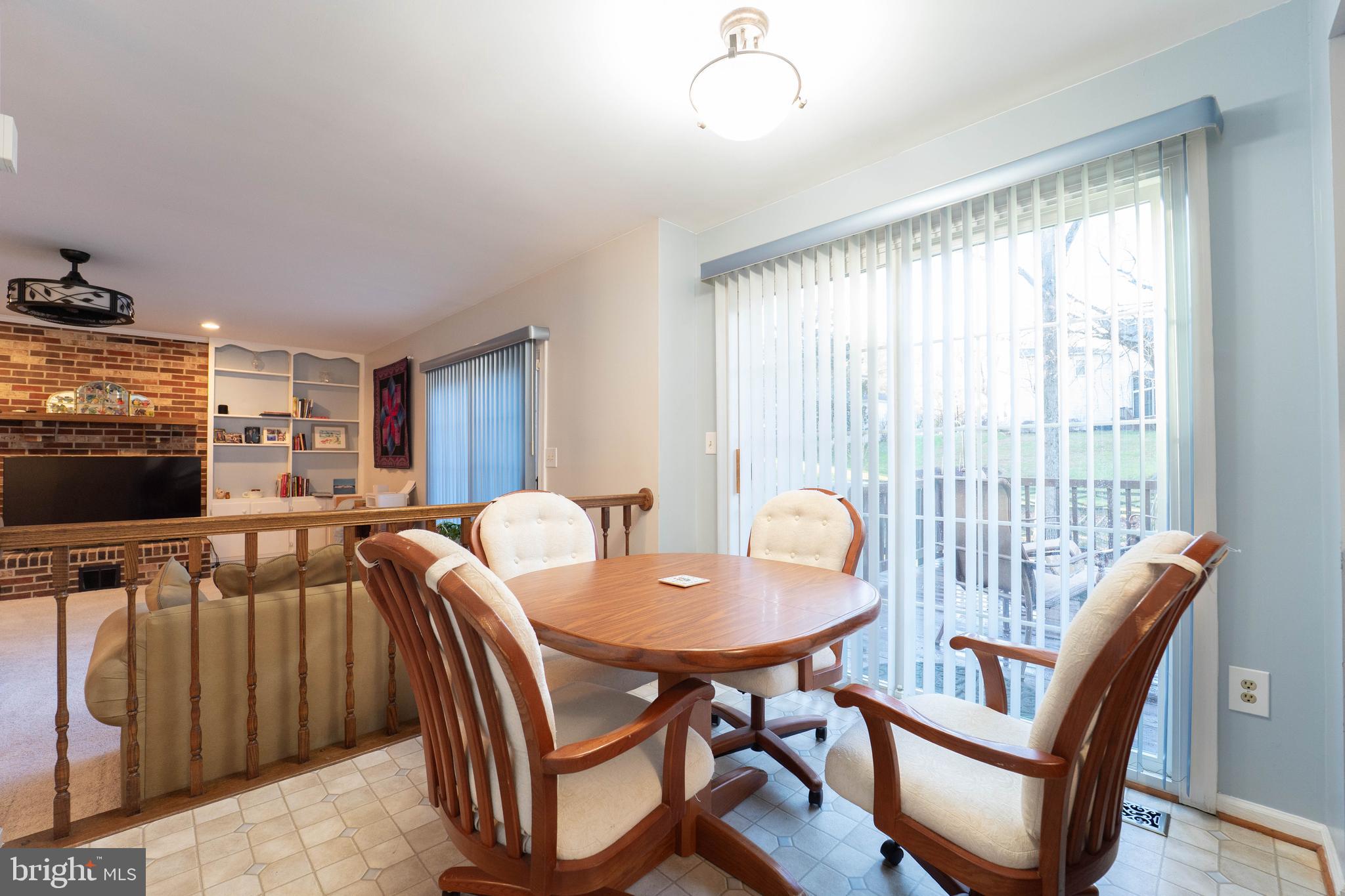 10531 Hunters Way Laurel, MD 20723 - Photo 10 of 42 a view of a dining room with furniture window and outside view