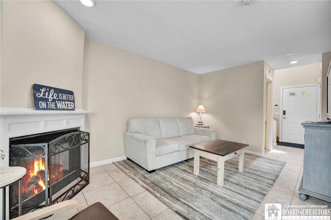 4406 West Lake Road, Unit 24 Chautauqua, NY 14757 - Photo 14 of 42 Newer gas fireplace to enjoy in the cooler months.