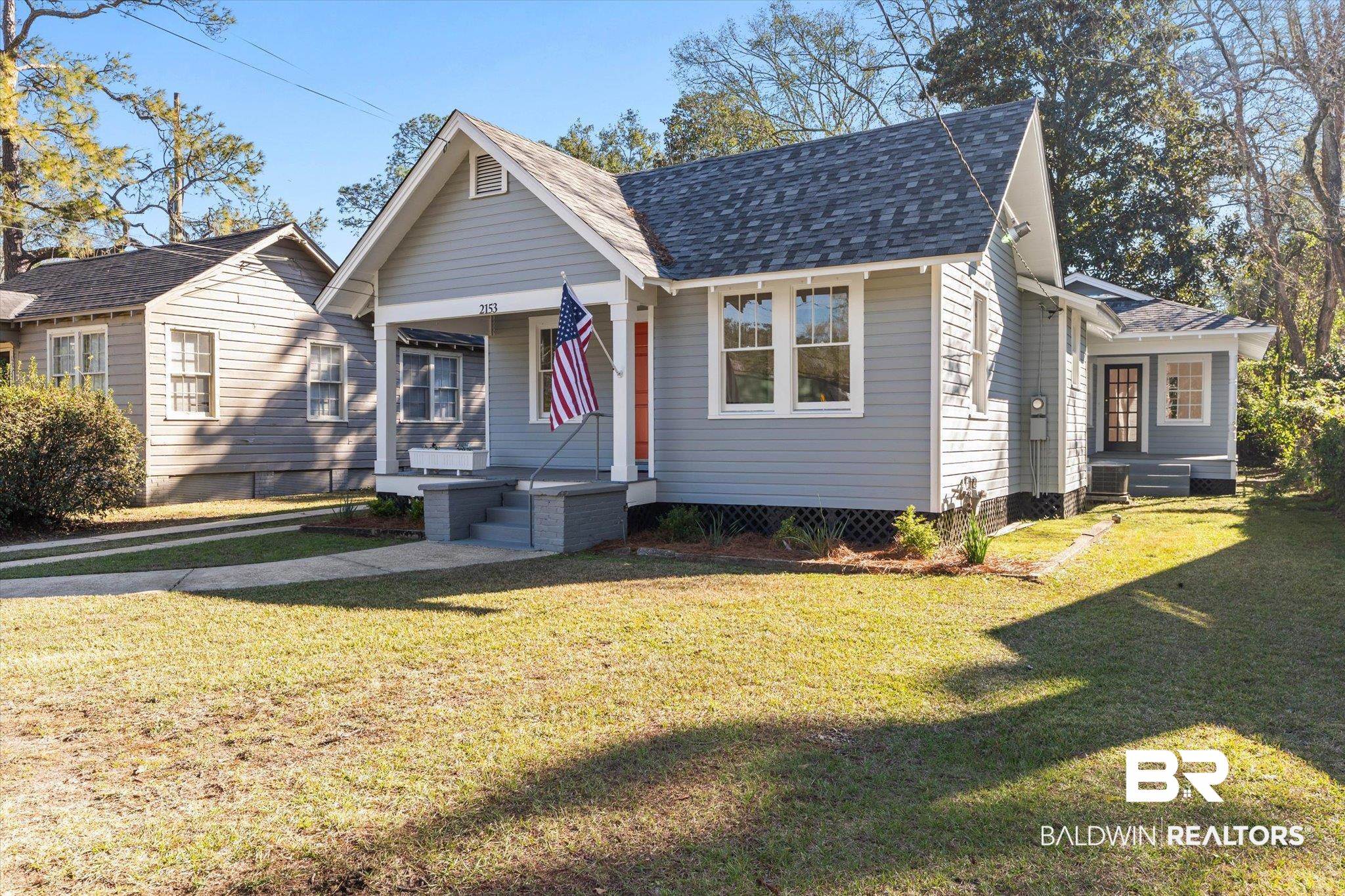 2153 Old Government Street Mobile, AL 36606 - Photo 20 of 23 Bungalow with roof with shingles and a front lawn