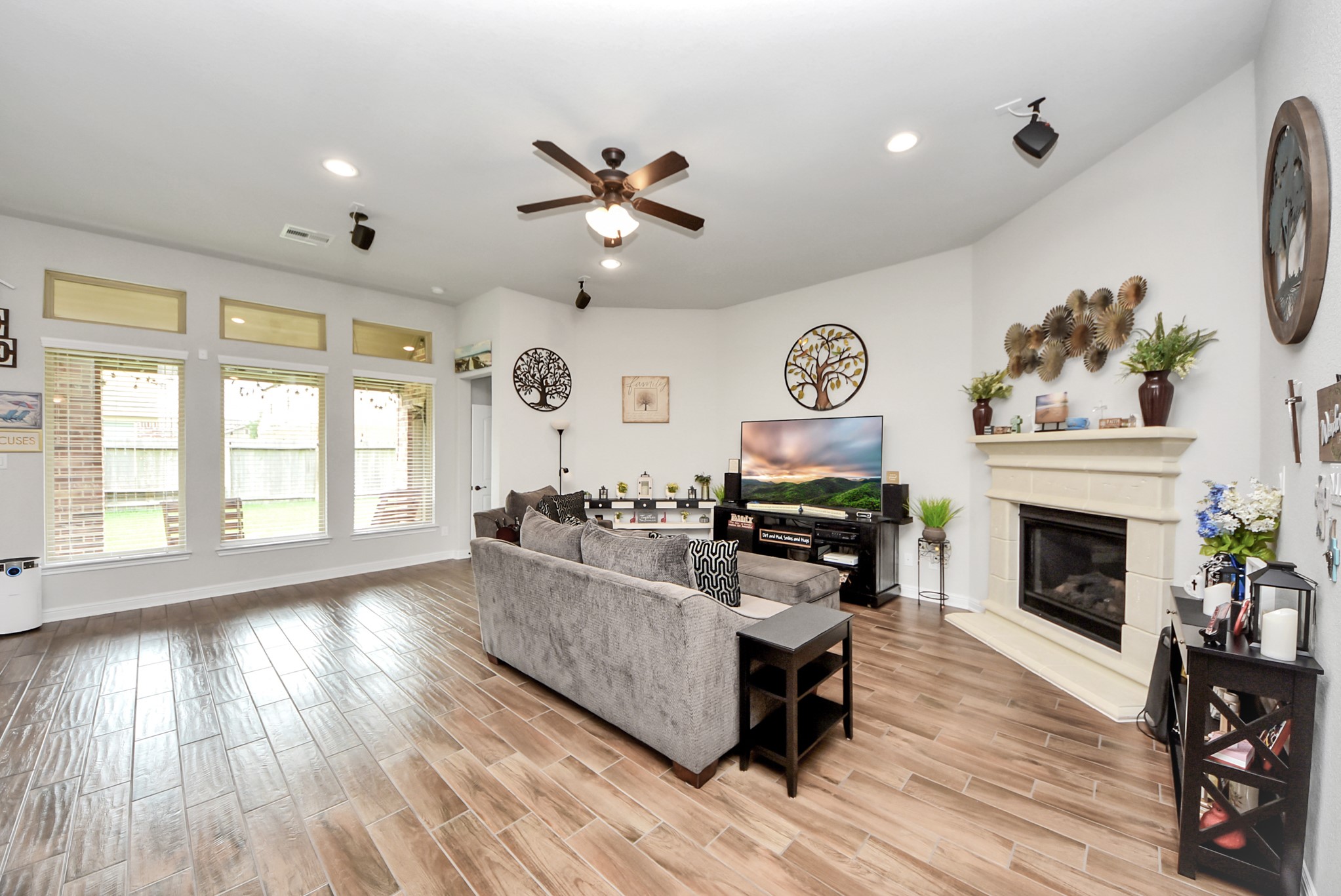 24503 Eucalyptus Way Spring, TX 77373 - Photo 22 of 27 a living room with furniture and a fireplace