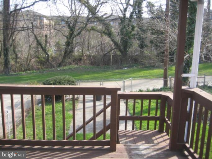 4835 Melbourne Road Baltimore, MD 21229 - Photo 4 of 7 a view of a wooden roof deck