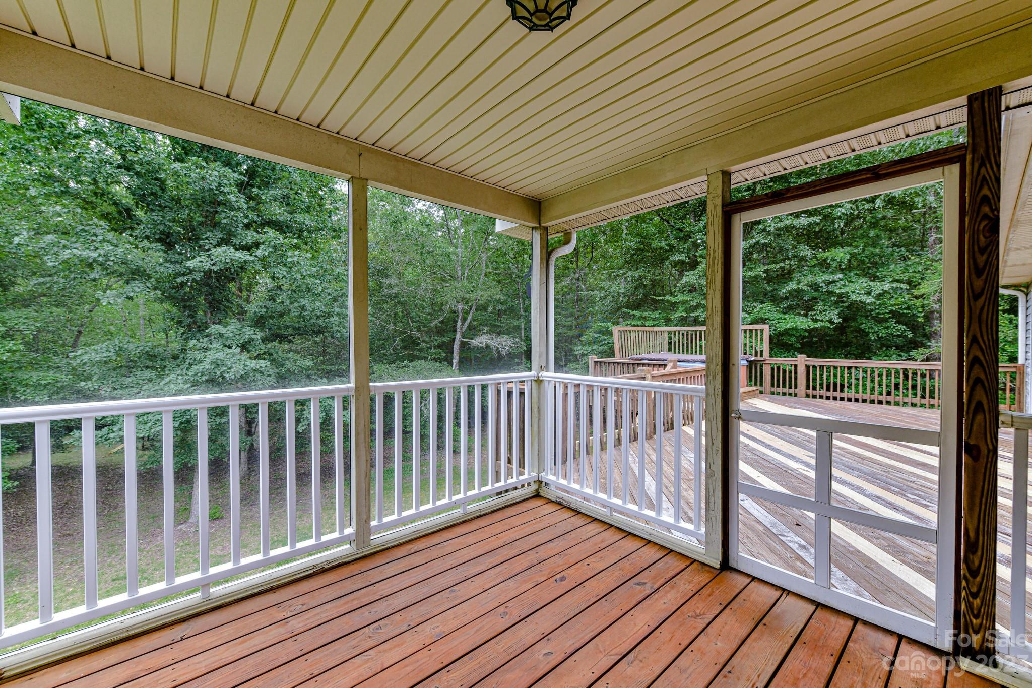 7911 Sims Road Waxhaw, NC 28173 - Photo 29 of 48 a view of a wooden deck