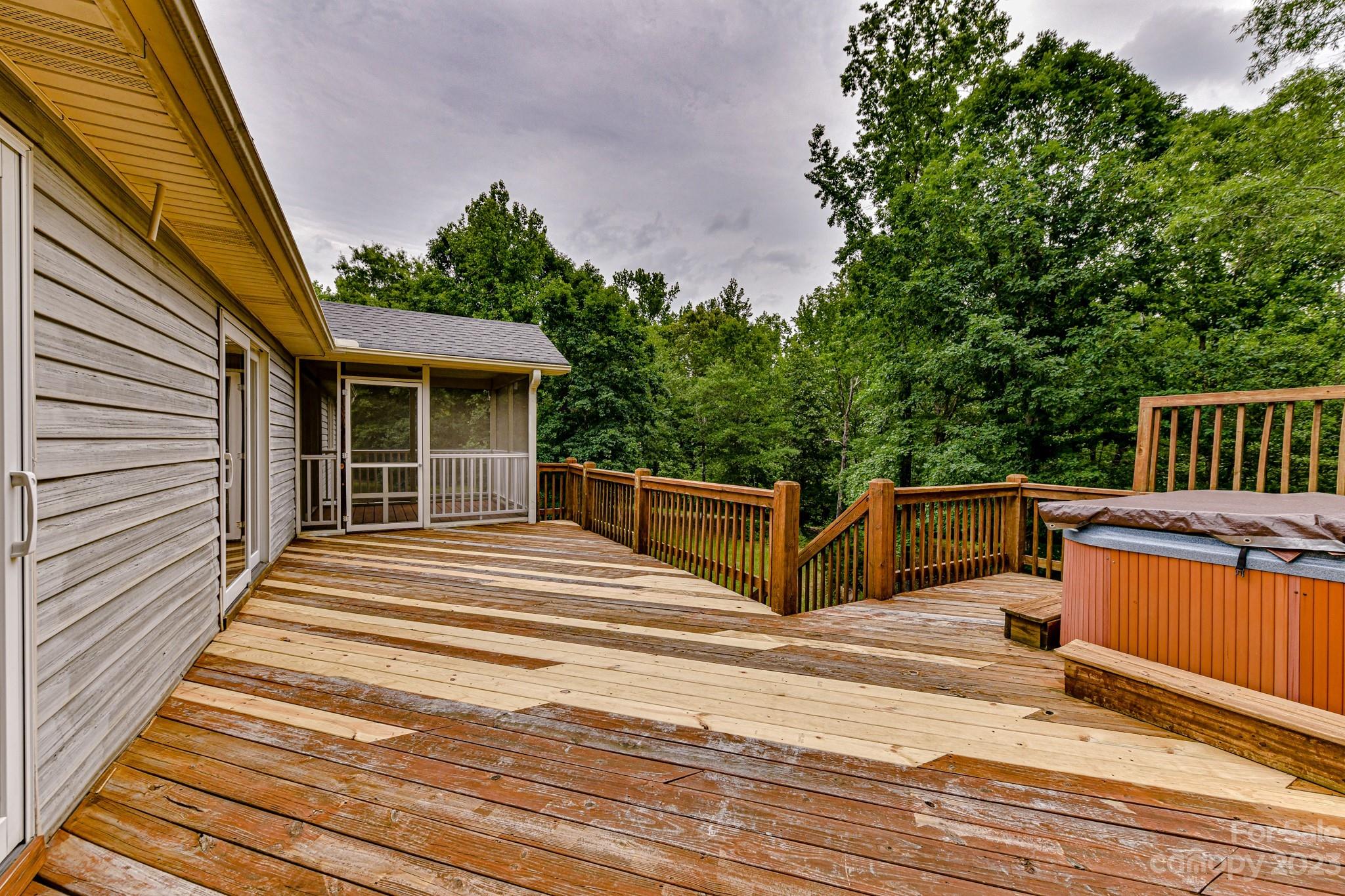 7911 Sims Road Waxhaw, NC 28173 - Photo 31 of 48 a view of a house with a wooden fence