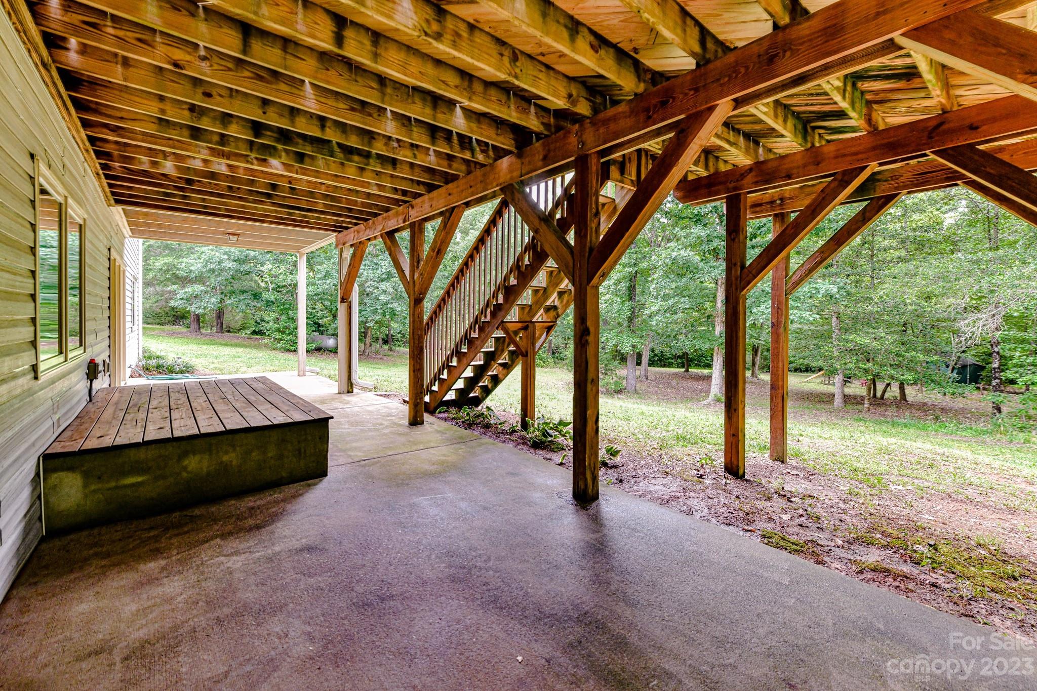 7911 Sims Road Waxhaw, NC 28173 - Photo 35 of 48 a view of yard with tree and wooden fence