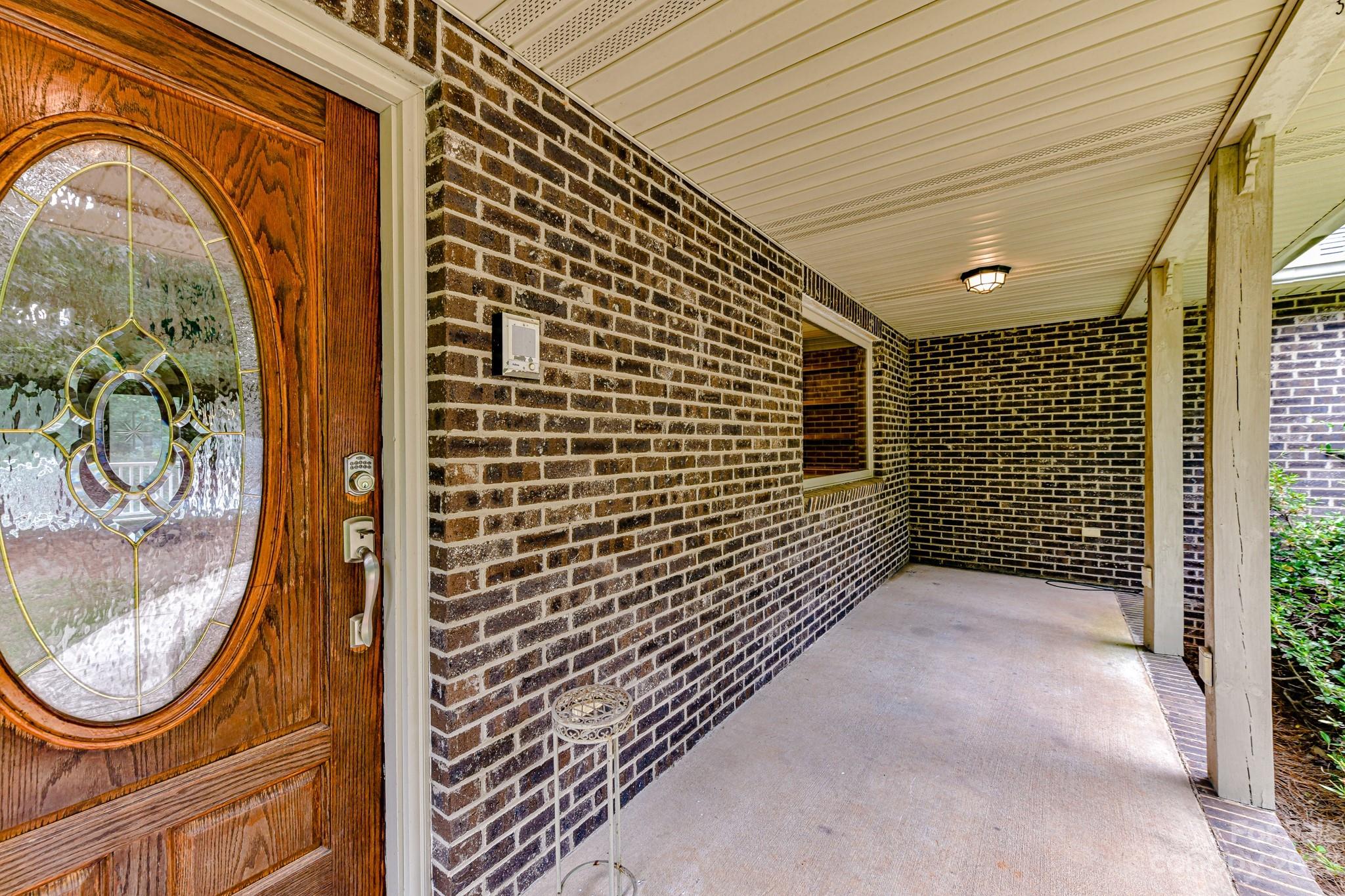 7911 Sims Road Waxhaw, NC 28173 - Photo 4 of 48 a view of a door of a house with a street