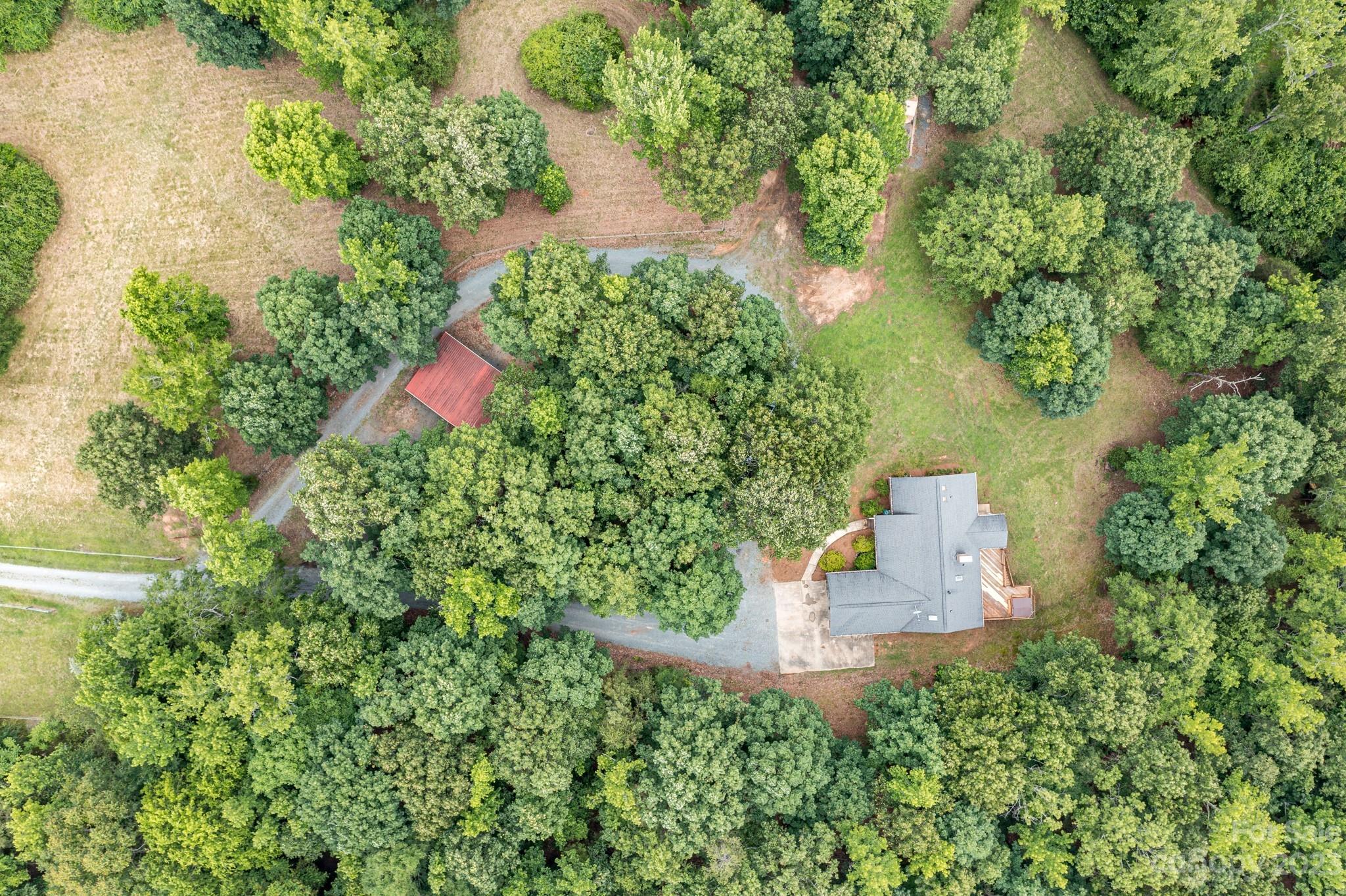 7911 Sims Road Waxhaw, NC 28173 - Photo 44 of 48 an aerial view of a house with a yard