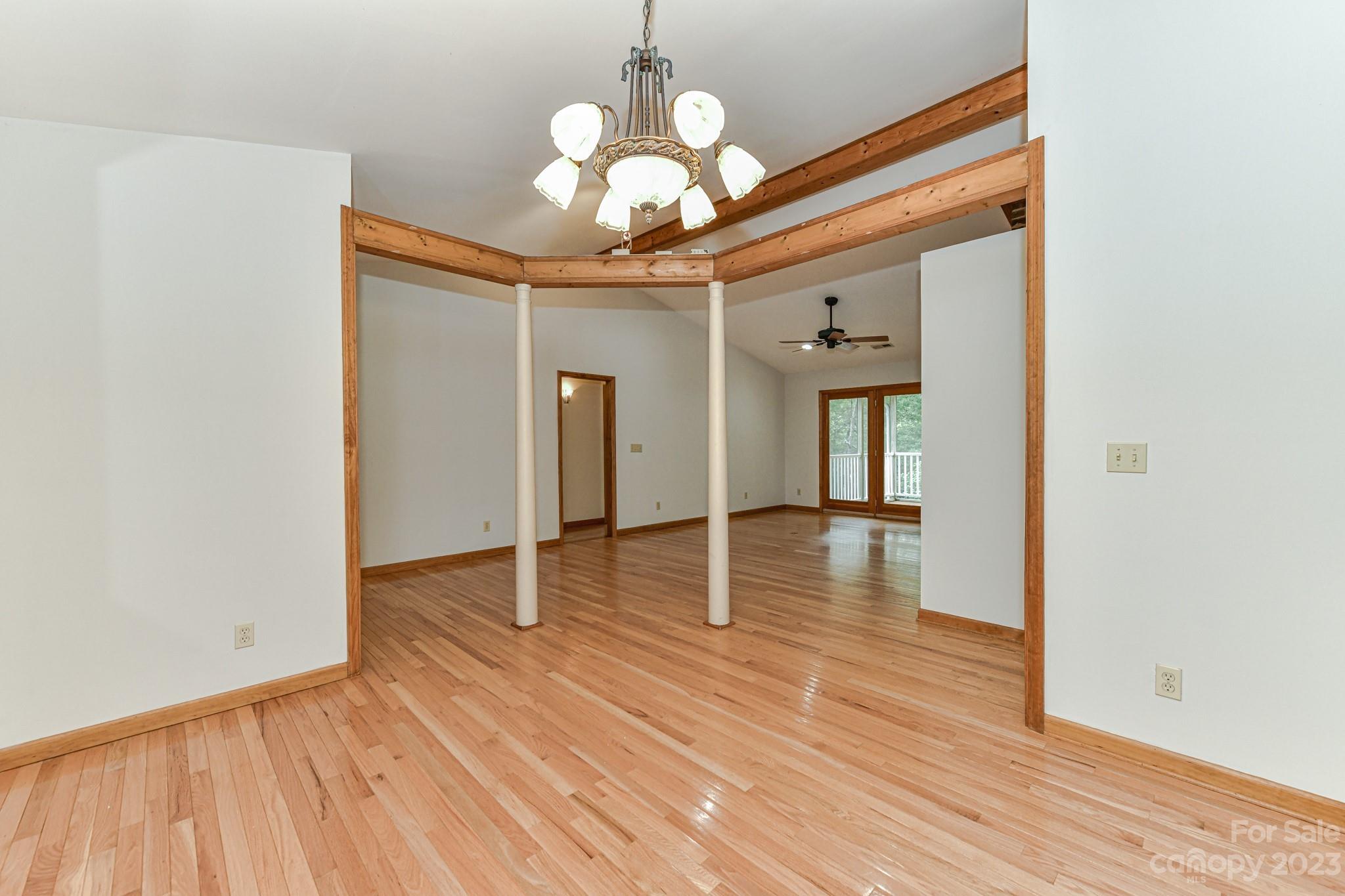 7911 Sims Road Waxhaw, NC 28173 - Photo 7 of 48 a view of a livingroom with wooden floor
