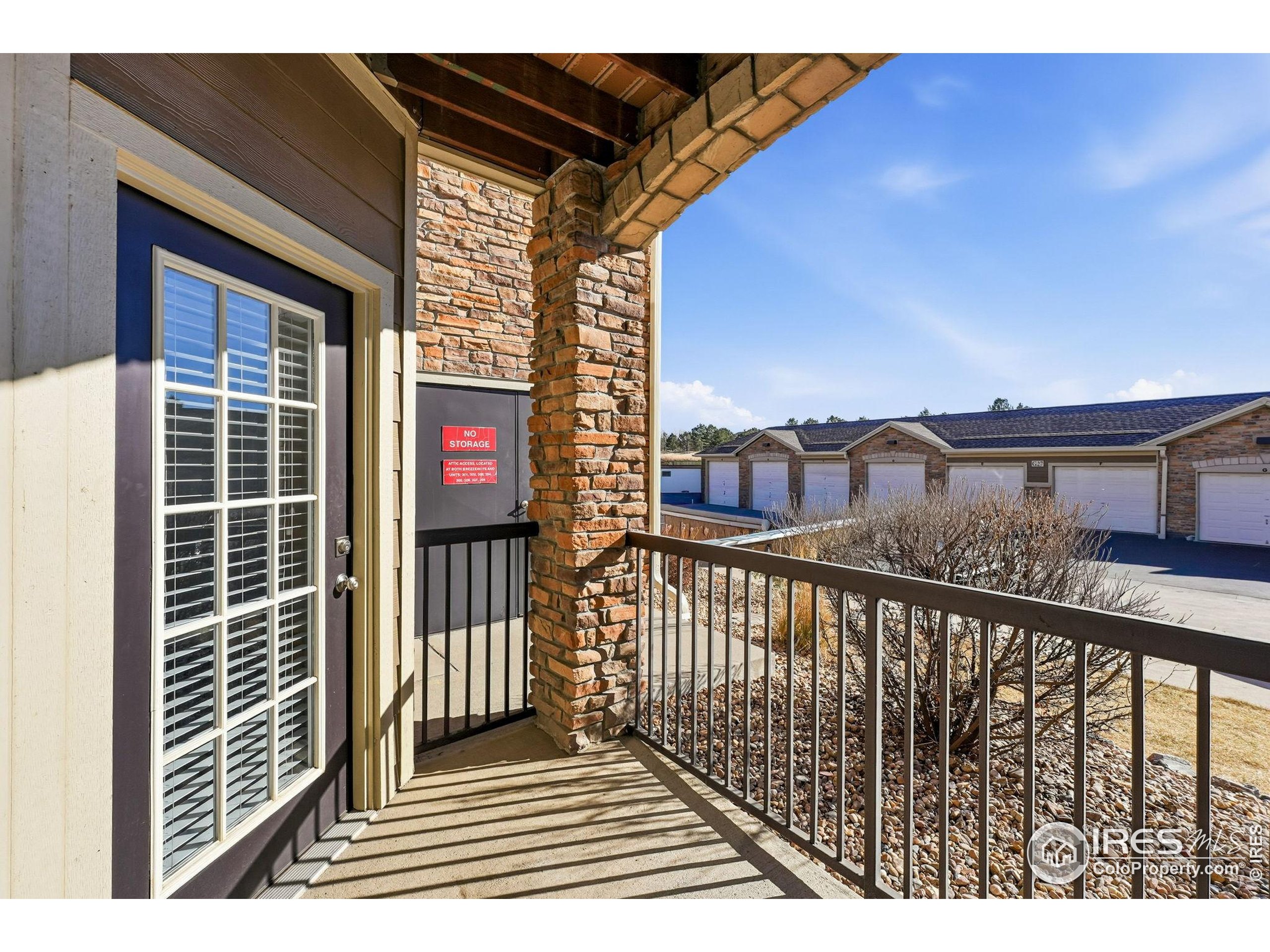 1425 Blue Sky Circle, Unit 15105 Erie, CO 80516 - Photo 18 of 45 a view of a house with a window