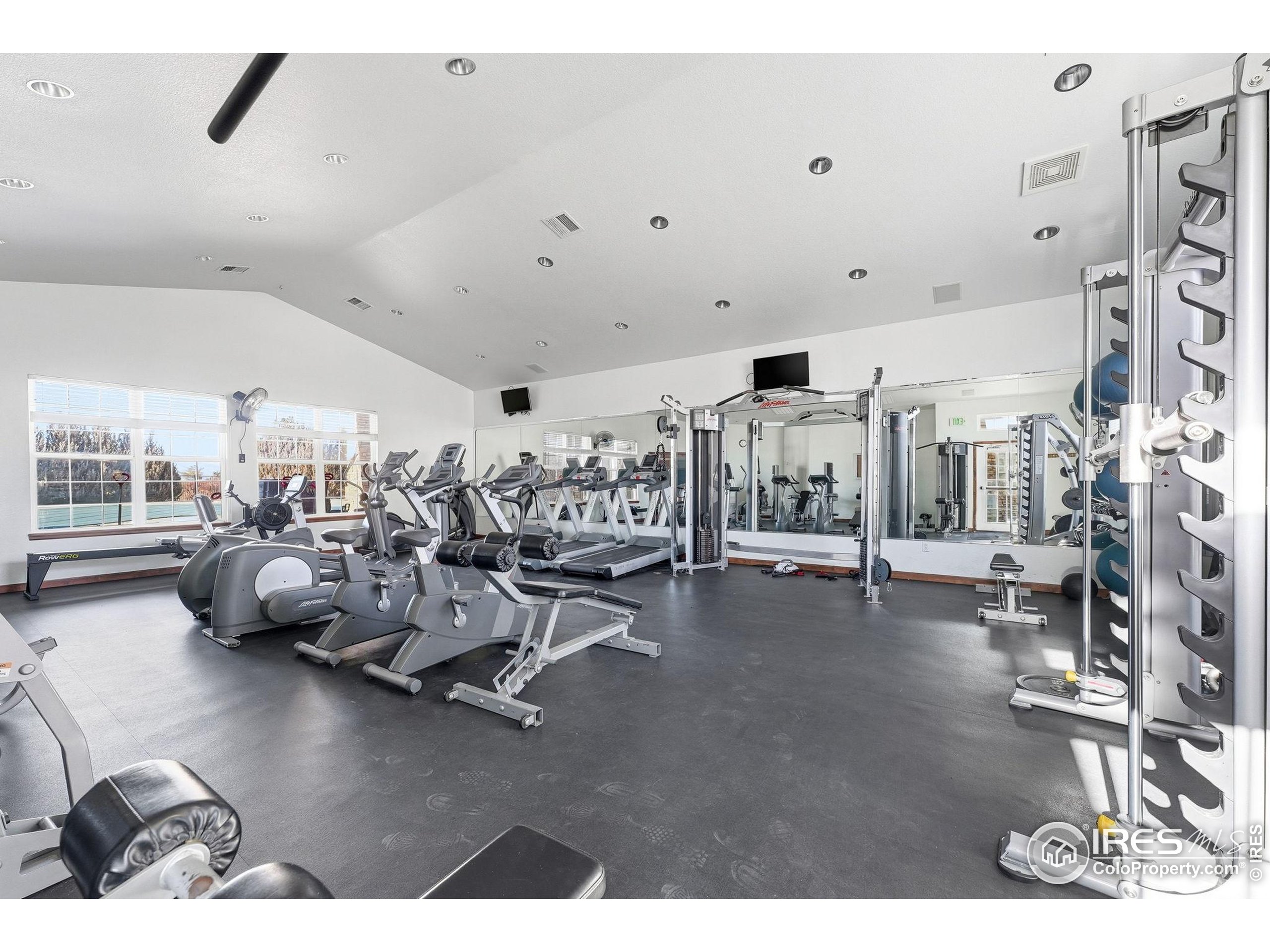 1425 Blue Sky Circle, Unit 15105 Erie, CO 80516 - Photo 42 of 45 a view of a room with gym equipment