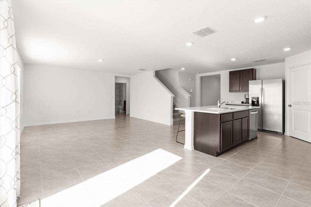 13691 Southwest 69th Terrace Ocala, FL 34473 - Photo 15 of 44 a view of a kitchen with a sink