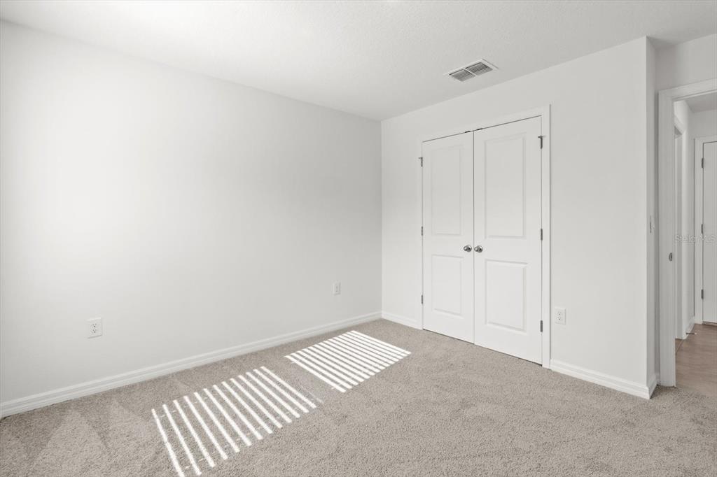 13691 Southwest 69th Terrace Ocala, FL 34473 - Photo 18 of 44 a view of an empty room