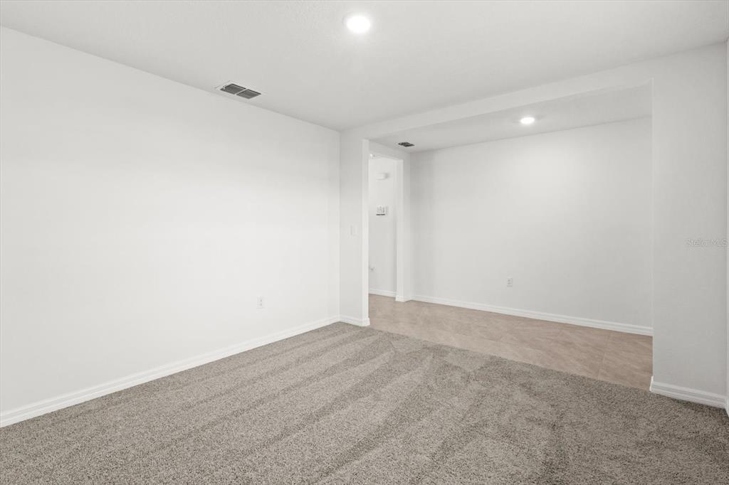 13691 Southwest 69th Terrace Ocala, FL 34473 - Photo 8 of 44 a view of an empty room