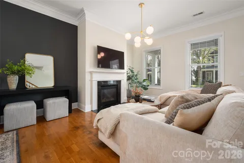 a bedroom with a bed and a fireplace