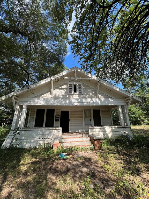 View of front of property with covered porch