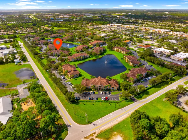 a bathroom with a double vanity sink and mirror