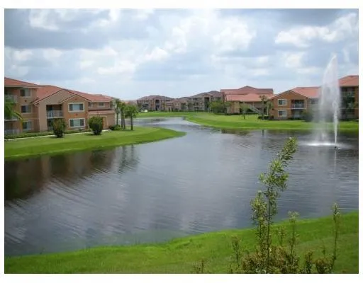 a view of outdoor space with deck and city view