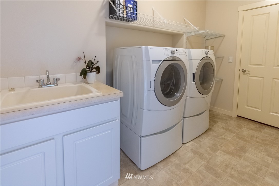 4407 219th Street Southeast Bothell, WA 98021 - Photo 16 of 33 a utility room with dryer and washer